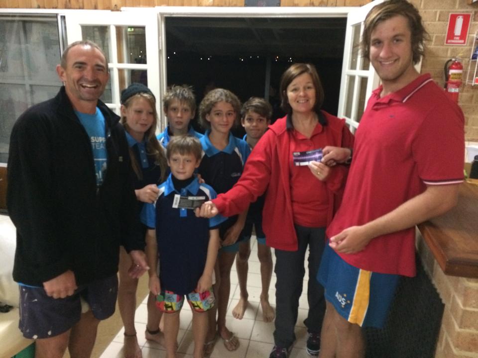 Tuesday 14th April 2015 Judith Thompson presenting tonights winners Mark Shellard and Tim Coward with movie vouchers with our Champion Lakes guests looking on.