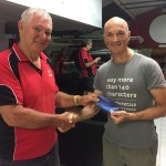 Tuesday 11th November 2015 : Club member Jerry Alderson presenting tonights joint winner Carlo Cottino with a movie voucher