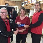 Tuesday 5th July, Club member David Gardiner presenting movie vouchers to tonights winners Steve and Cindy Coward