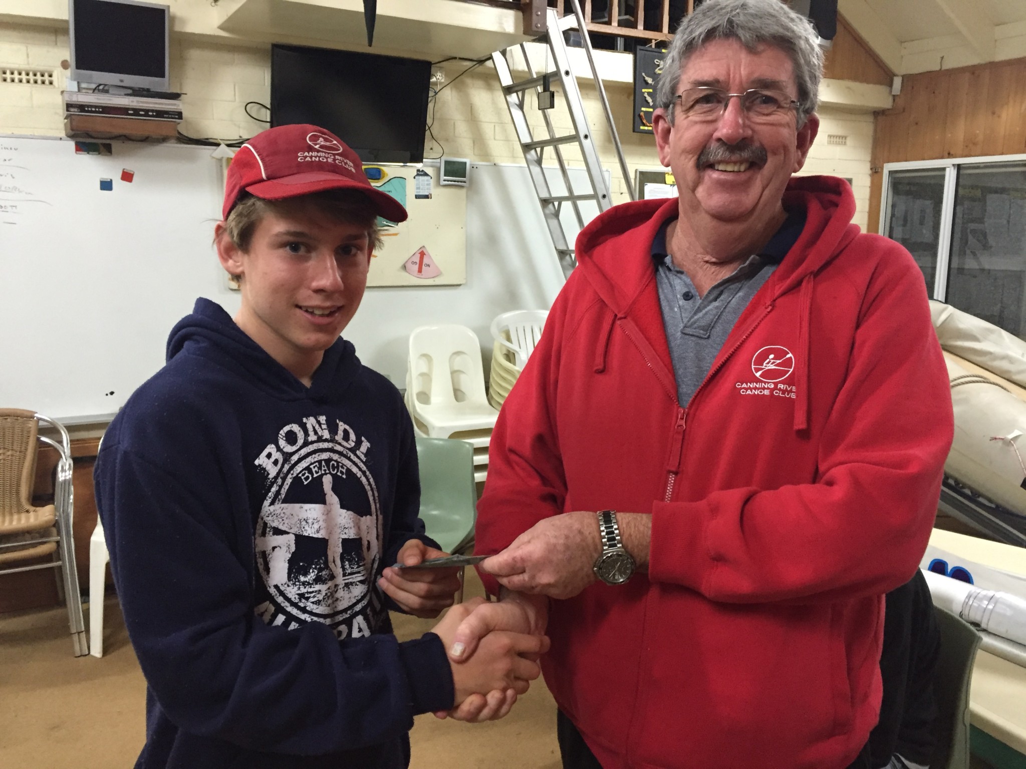 Tues 26th July 2016 : Tonights photo shows club member Dave Griffiths presenting Tom with his prize.