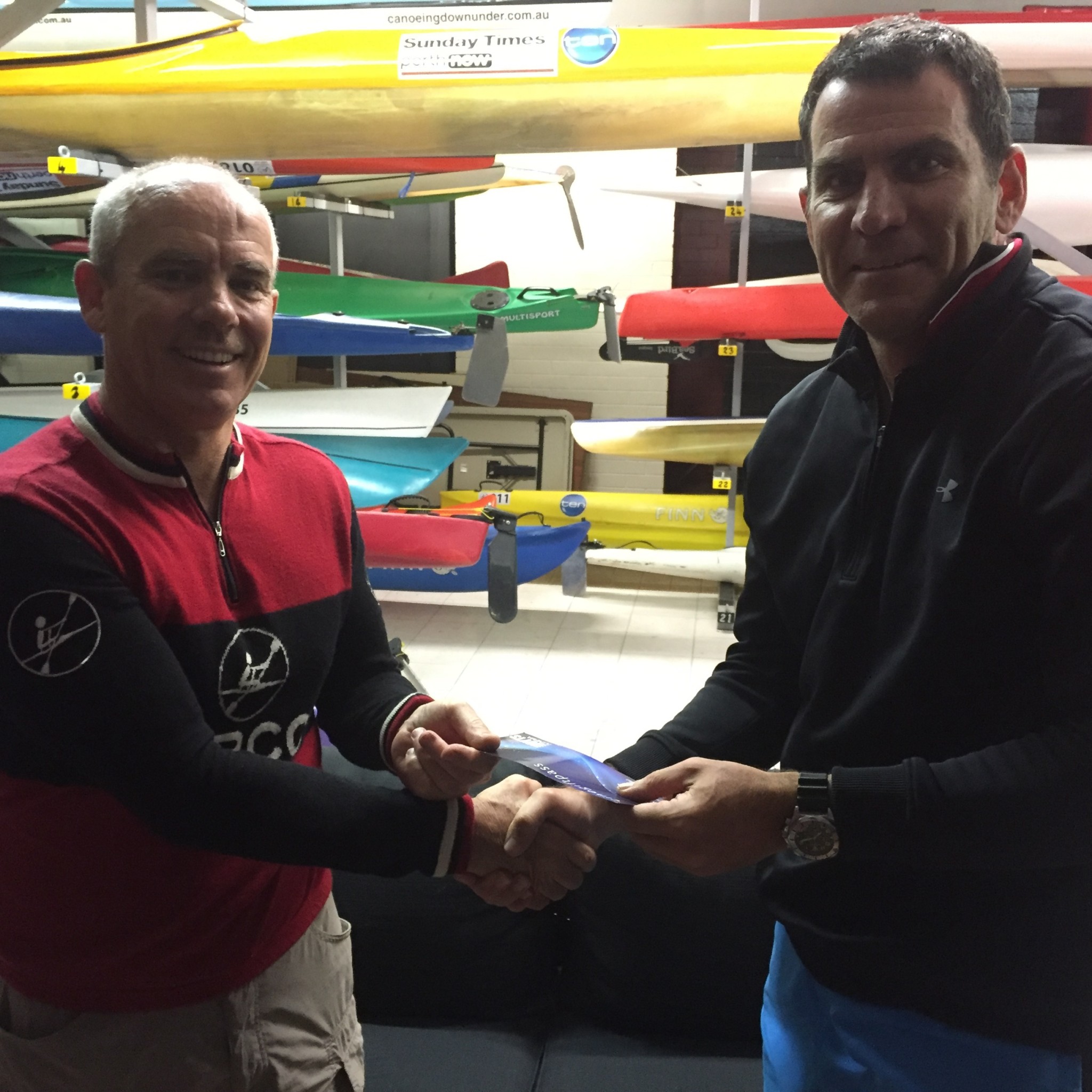 Tuesday 8th November 2016 : Tonight's photo shows club Committee member Stuart Hyde presenting Peter Fergusson with his movie voucher