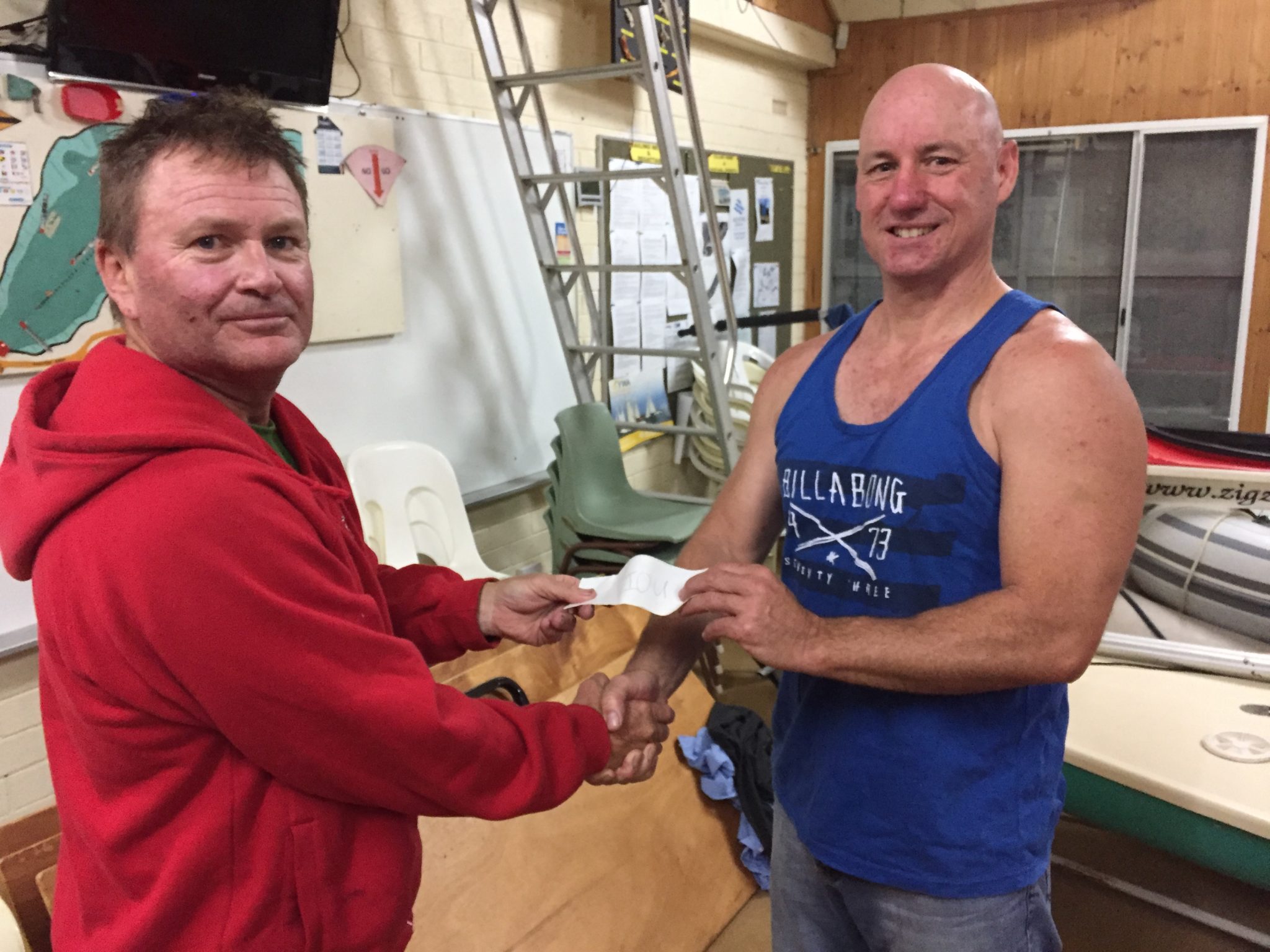Tues 20th June 2017 : Tonight's photo shows club member Francis Nolan presenting Greg with a movie voucher