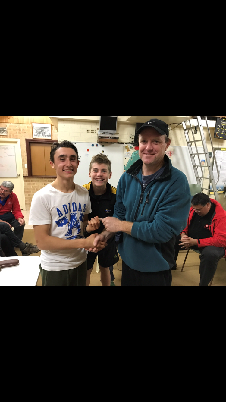 Tues 18th July 2017 : Tonights photo shows Club member Simon O'Sullivan presenting Luke with a movie voucher