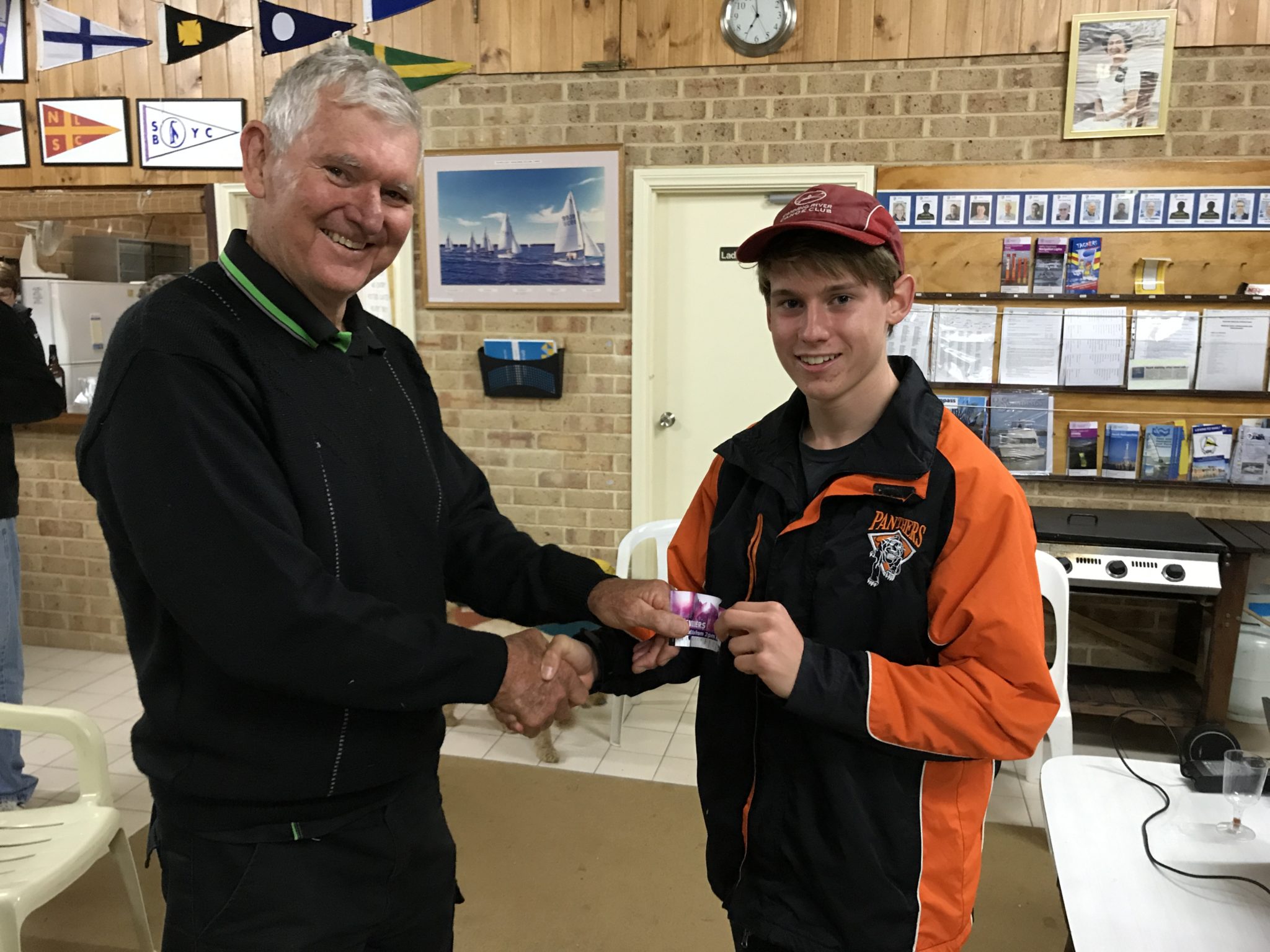 Tues 26th September 2017 : Tonight’s photo shows club member Tom Green presenting Jerry with a movie voucher