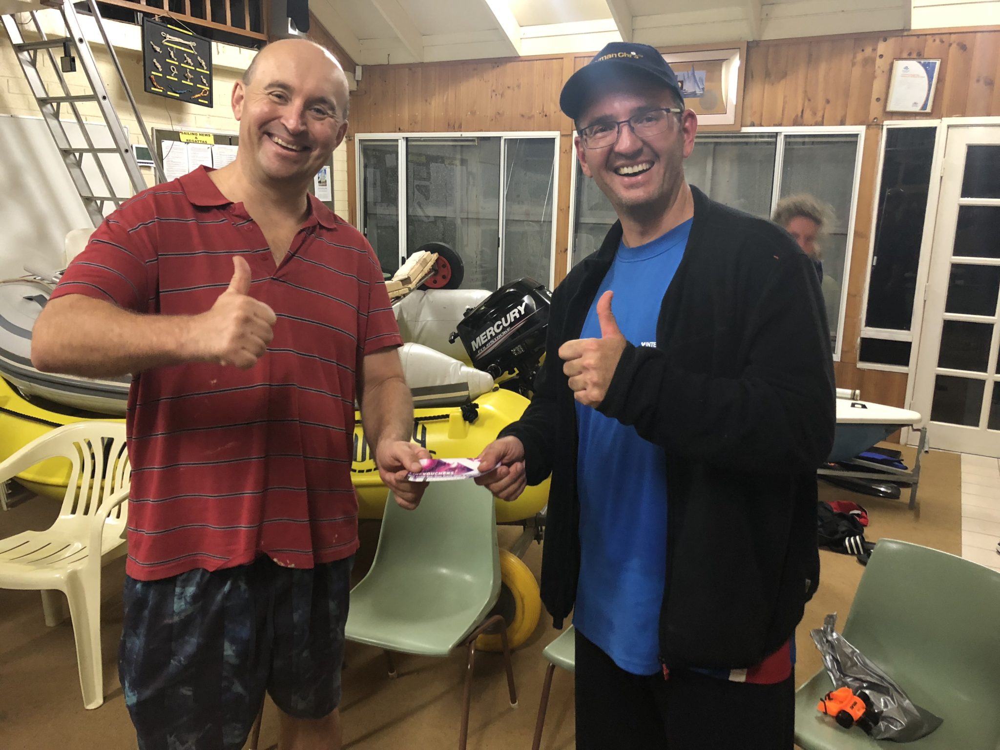 Tuesday 24th July 2018 : Tonight’s photo shows Chris Sawicki presenting Mike Galanty with a movie voucher