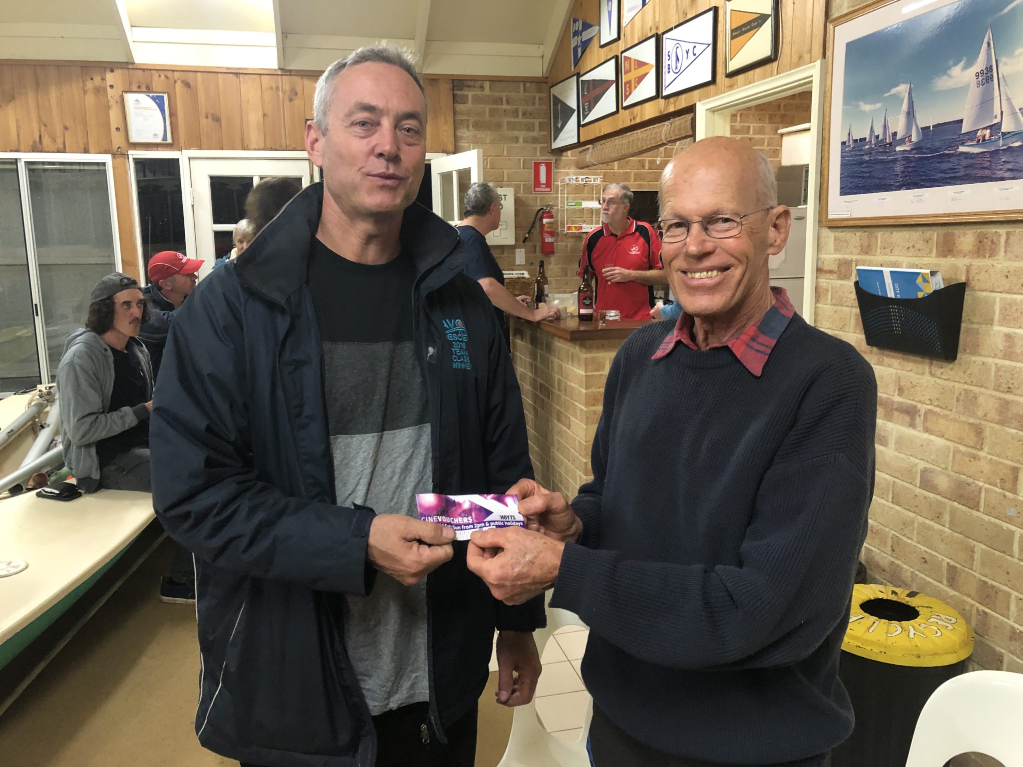 Tuesday 30th July 2019 : Tonight’s photo shows club member John Reddel presenting tonight’s winner Luc Jacob with a movie voucher.