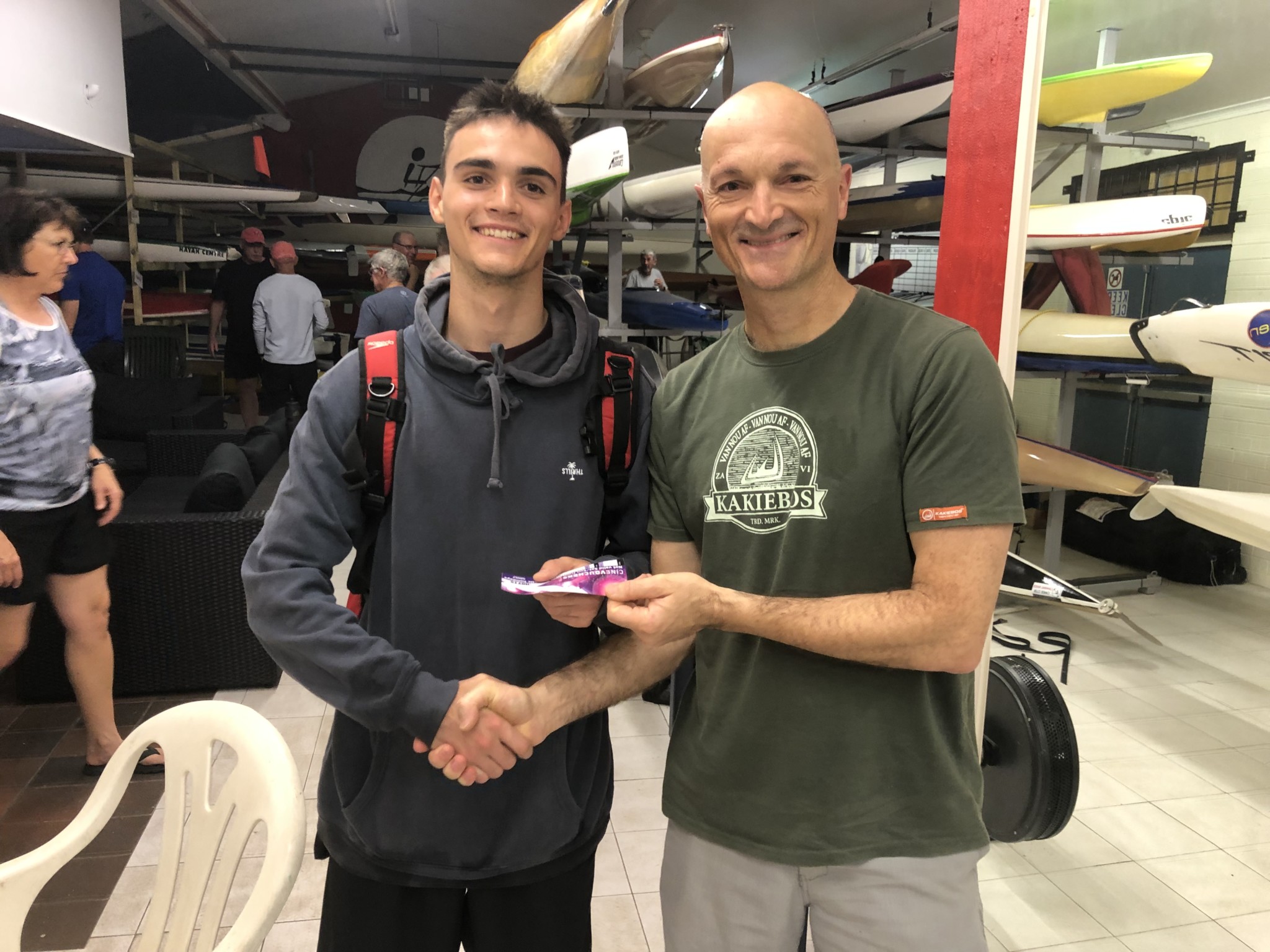 Tuesday 10th December 2019 : Tonight’s photo shows club member Carlo Cottino presenting his son Alessio Cottino with the winners movie voucher. 