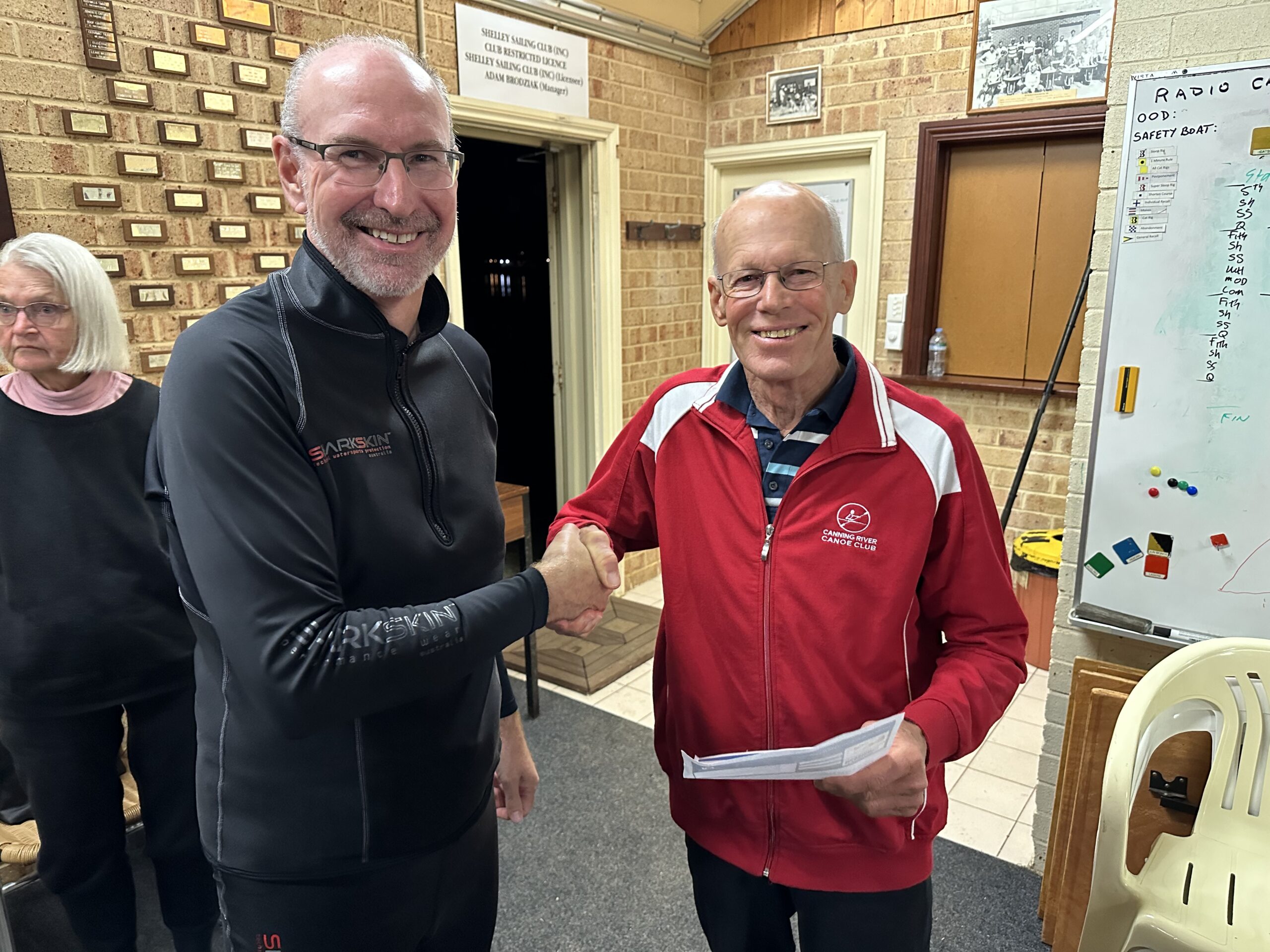 Tuesday 30th May 2023 : Tonight’s photo shows club Treasurer David Urquhart presenting John Reddel with a movie voucher prize.